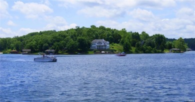 Beautiful WATERFRONT home situated on a 127+ acre lake with on Raintree Country Club in Missouri - for sale on GolfHomes.com, golf home, golf lot
