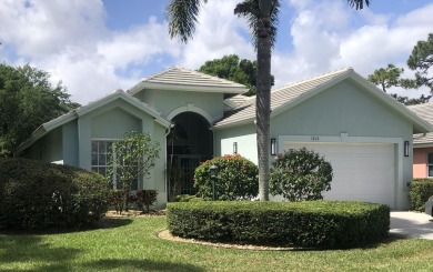 Located on an almost 1/2 acre lot, overlooking one of the many on The Legacy Golf and Tennis Club in Florida - for sale on GolfHomes.com, golf home, golf lot