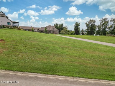 Imagine waking up to the serene beauty of a shimmering lake just on Wind River Golf Course in Tennessee - for sale on GolfHomes.com, golf home, golf lot