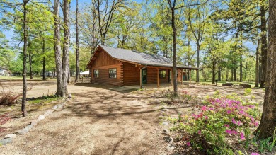 This stunning log cabin, located just moments from Yarborough on  in Arkansas - for sale on GolfHomes.com, golf home, golf lot