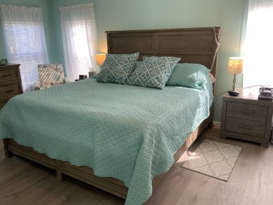 The Lot Rent for this home is $1,248.00/monthly.  You can walk on Pine Lakes Country Club in Florida - for sale on GolfHomes.com, golf home, golf lot