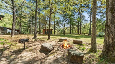This stunning log cabin, located just moments from Yarborough on  in Arkansas - for sale on GolfHomes.com, golf home, golf lot