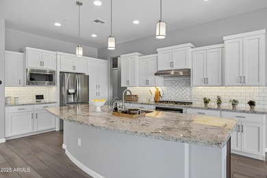 Luxury and comfort blend seamlessly in this exquisite Latigo on Vista Verde Golf Course in Arizona - for sale on GolfHomes.com, golf home, golf lot