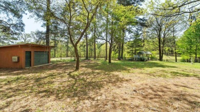 This stunning log cabin, located just moments from Yarborough on  in Arkansas - for sale on GolfHomes.com, golf home, golf lot