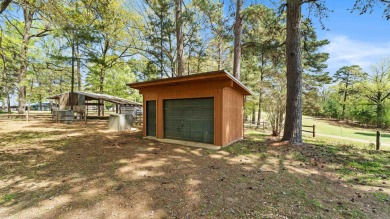 This stunning log cabin, located just moments from Yarborough on  in Arkansas - for sale on GolfHomes.com, golf home, golf lot