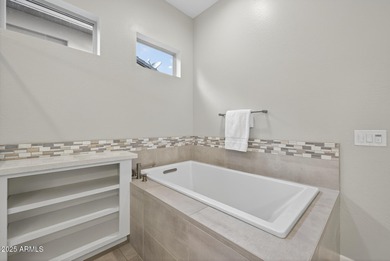 Luxury and comfort blend seamlessly in this exquisite Latigo on Vista Verde Golf Course in Arizona - for sale on GolfHomes.com, golf home, golf lot