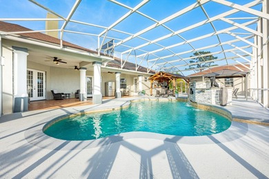 1.03 ACRES | NEWER ROOF & UPDATED MECHANICALS | LUXURY UPGRADES on Wedgefield Golf Club in Florida - for sale on GolfHomes.com, golf home, golf lot