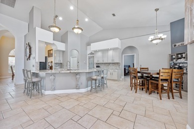 1.03 ACRES | NEWER ROOF & UPDATED MECHANICALS | LUXURY UPGRADES on Wedgefield Golf Club in Florida - for sale on GolfHomes.com, golf home, golf lot