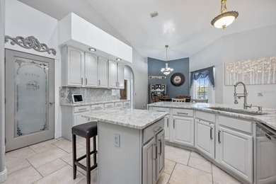 1.03 ACRES | NEWER ROOF & UPDATED MECHANICALS | LUXURY UPGRADES on Wedgefield Golf Club in Florida - for sale on GolfHomes.com, golf home, golf lot