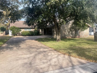 Four bedroom, three bath Golf Course home located on Number 5 on Slick Rock Golf Course - Horseshoe Bay in Texas - for sale on GolfHomes.com, golf home, golf lot