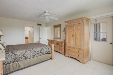 WELCOME TO THIS NATURALLY BRIGHT CONDO WITH SOUTH FACING VIEWS on Poinciana Golf Club in Florida - for sale on GolfHomes.com, golf home, golf lot