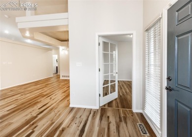 Great 1 level living in this immaculate 3788 sq ft 4 bedroom & on Pine Creek Golf Club in Colorado - for sale on GolfHomes.com, golf home, golf lot
