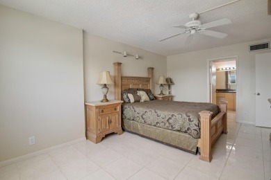 WELCOME TO THIS NATURALLY BRIGHT CONDO WITH SOUTH FACING VIEWS on Poinciana Golf Club in Florida - for sale on GolfHomes.com, golf home, golf lot
