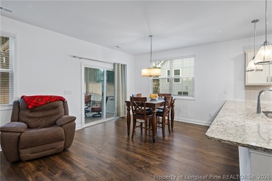 Pristine 2024 Mid-South Club home on an elevated lot with thick on Mid South Club in North Carolina - for sale on GolfHomes.com, golf home, golf lot