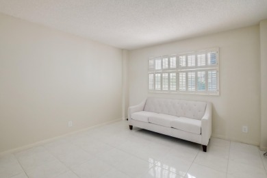 WELCOME TO THIS NATURALLY BRIGHT CONDO WITH SOUTH FACING VIEWS on Poinciana Golf Club in Florida - for sale on GolfHomes.com, golf home, golf lot