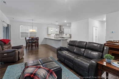 Pristine 2024 Mid-South Club home on an elevated lot with thick on Mid South Club in North Carolina - for sale on GolfHomes.com, golf home, golf lot