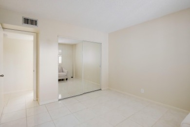 WELCOME TO THIS NATURALLY BRIGHT CONDO WITH SOUTH FACING VIEWS on Poinciana Golf Club in Florida - for sale on GolfHomes.com, golf home, golf lot