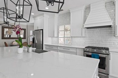 Welcome to 4600 Sailmaker Lane, a beautifully renovated on Regatta Bay Golf and Country Club in Florida - for sale on GolfHomes.com, golf home, golf lot