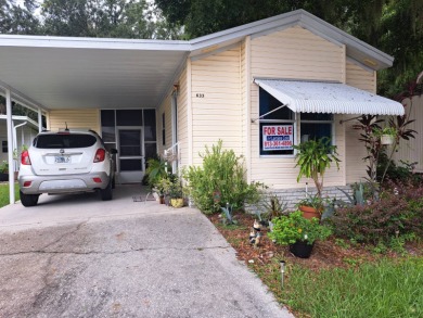 Located in a very active 55+ community close to shopping on Golden Lakes Golf Course in Florida - for sale on GolfHomes.com, golf home, golf lot