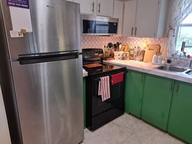 Located in a very active 55+ community close to shopping on Golden Lakes Golf Course in Florida - for sale on GolfHomes.com, golf home, golf lot