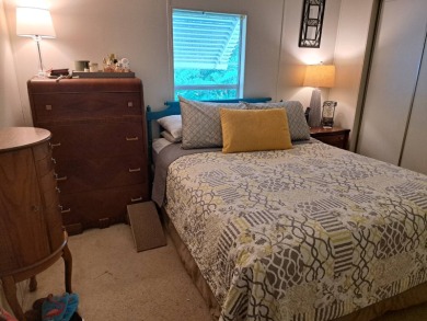 Located in a very active 55+ community close to shopping on Golden Lakes Golf Course in Florida - for sale on GolfHomes.com, golf home, golf lot