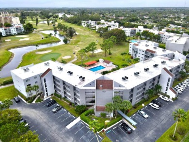 WELCOME TO THIS NATURALLY BRIGHT CONDO WITH SOUTH FACING VIEWS on Poinciana Golf Club in Florida - for sale on GolfHomes.com, golf home, golf lot