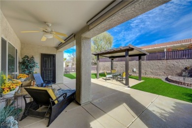 This stunning home offers exceptional curb appeal with elegant on Revere Golf Club in Nevada - for sale on GolfHomes.com, golf home, golf lot