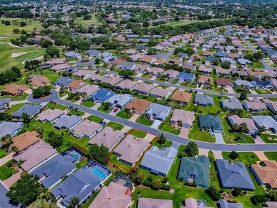 BOND PAID! NEWER ROOF & HVAC (2018).  WELL-LOVED & SPACIOUS 3/2 on The Links of Spruce Creek in Florida - for sale on GolfHomes.com, golf home, golf lot