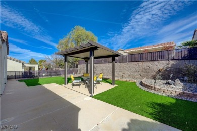 This stunning home offers exceptional curb appeal with elegant on Revere Golf Club in Nevada - for sale on GolfHomes.com, golf home, golf lot