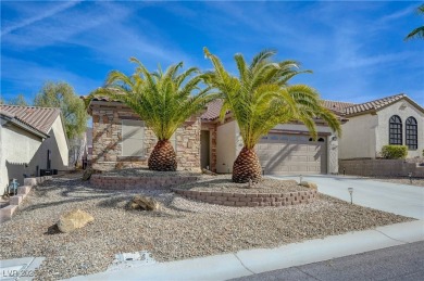 This stunning home offers exceptional curb appeal with elegant on Revere Golf Club in Nevada - for sale on GolfHomes.com, golf home, golf lot