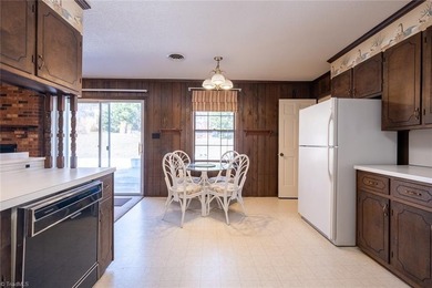 One level ranch in Pine Knolls subdivision!  This property has on Pine Knolls Golf Course in North Carolina - for sale on GolfHomes.com, golf home, golf lot