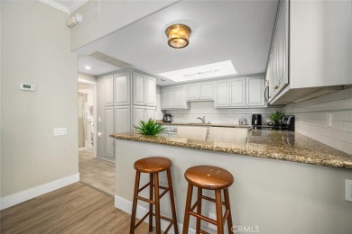 Step inside and be greeted by an expansive open floor plan on Leisure World Seal Beach Golf Course in California - for sale on GolfHomes.com, golf home, golf lot
