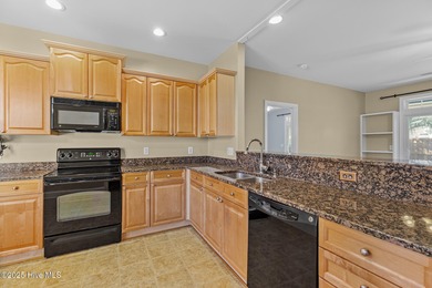 Welcome to a beautifully maintained home in the highly desirable on Magnolia Greens Golf Plantation in North Carolina - for sale on GolfHomes.com, golf home, golf lot