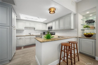 Step inside and be greeted by an expansive open floor plan on Leisure World Seal Beach Golf Course in California - for sale on GolfHomes.com, golf home, golf lot
