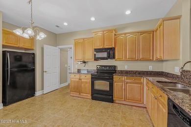 Welcome to a beautifully maintained home in the highly desirable on Magnolia Greens Golf Plantation in North Carolina - for sale on GolfHomes.com, golf home, golf lot