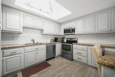 Step inside and be greeted by an expansive open floor plan on Leisure World Seal Beach Golf Course in California - for sale on GolfHomes.com, golf home, golf lot