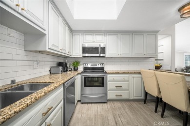 Step inside and be greeted by an expansive open floor plan on Leisure World Seal Beach Golf Course in California - for sale on GolfHomes.com, golf home, golf lot