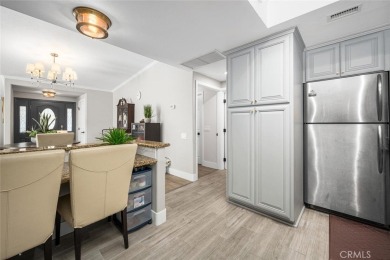 Step inside and be greeted by an expansive open floor plan on Leisure World Seal Beach Golf Course in California - for sale on GolfHomes.com, golf home, golf lot