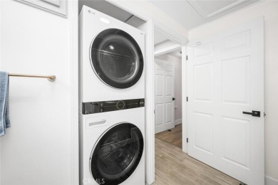 Step inside and be greeted by an expansive open floor plan on Leisure World Seal Beach Golf Course in California - for sale on GolfHomes.com, golf home, golf lot
