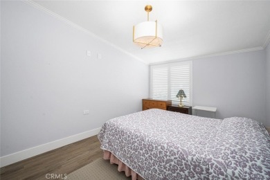 Step inside and be greeted by an expansive open floor plan on Leisure World Seal Beach Golf Course in California - for sale on GolfHomes.com, golf home, golf lot