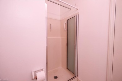 One level ranch in Pine Knolls subdivision!  This property has on Pine Knolls Golf Course in North Carolina - for sale on GolfHomes.com, golf home, golf lot