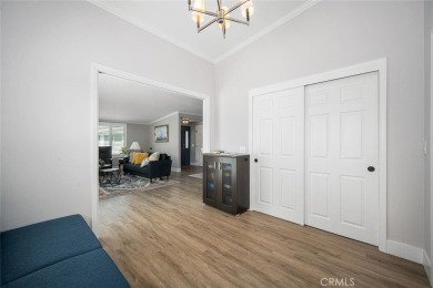 Step inside and be greeted by an expansive open floor plan on Leisure World Seal Beach Golf Course in California - for sale on GolfHomes.com, golf home, golf lot