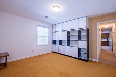 One level ranch in Pine Knolls subdivision!  This property has on Pine Knolls Golf Course in North Carolina - for sale on GolfHomes.com, golf home, golf lot