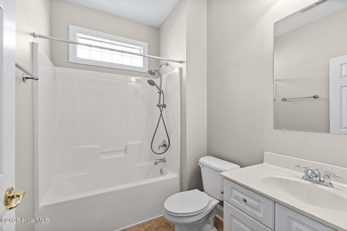 Welcome to a beautifully maintained home in the highly desirable on Magnolia Greens Golf Plantation in North Carolina - for sale on GolfHomes.com, golf home, golf lot