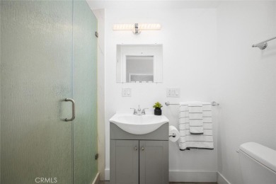 Step inside and be greeted by an expansive open floor plan on Leisure World Seal Beach Golf Course in California - for sale on GolfHomes.com, golf home, golf lot