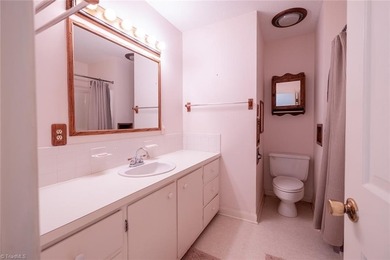 One level ranch in Pine Knolls subdivision!  This property has on Pine Knolls Golf Course in North Carolina - for sale on GolfHomes.com, golf home, golf lot