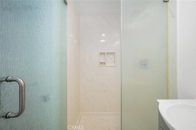 Step inside and be greeted by an expansive open floor plan on Leisure World Seal Beach Golf Course in California - for sale on GolfHomes.com, golf home, golf lot