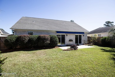 Welcome to a beautifully maintained home in the highly desirable on Magnolia Greens Golf Plantation in North Carolina - for sale on GolfHomes.com, golf home, golf lot