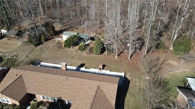 One level ranch in Pine Knolls subdivision!  This property has on Pine Knolls Golf Course in North Carolina - for sale on GolfHomes.com, golf home, golf lot