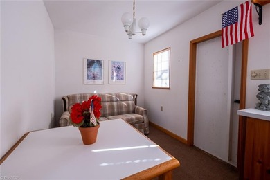 One level ranch in Pine Knolls subdivision!  This property has on Pine Knolls Golf Course in North Carolina - for sale on GolfHomes.com, golf home, golf lot